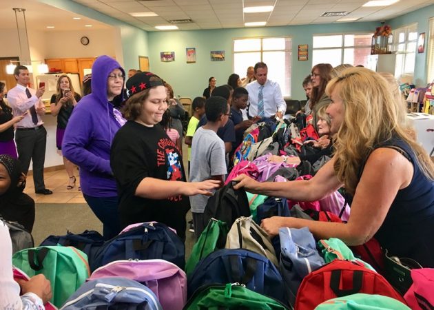 EON volunteers distributed backpacks at an event organized by The Salvation Army.